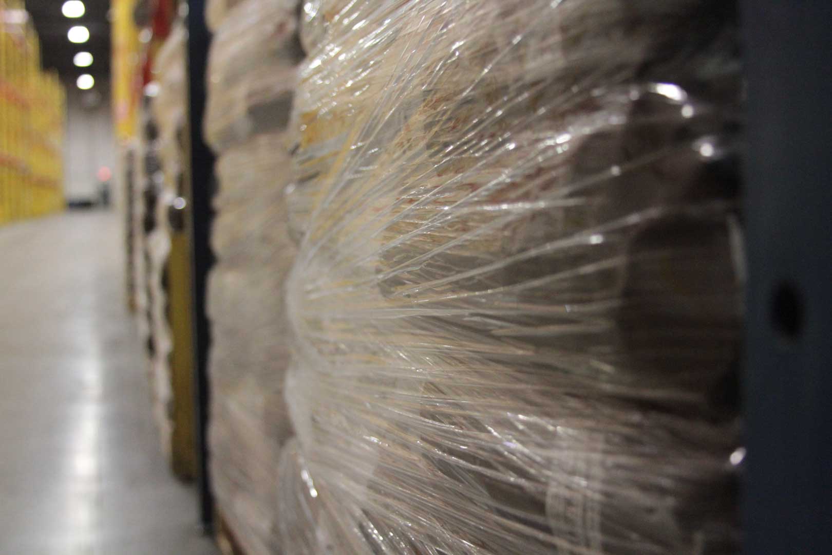 DTS Warehousing A shrink-wrapped pallet in a warehouse.