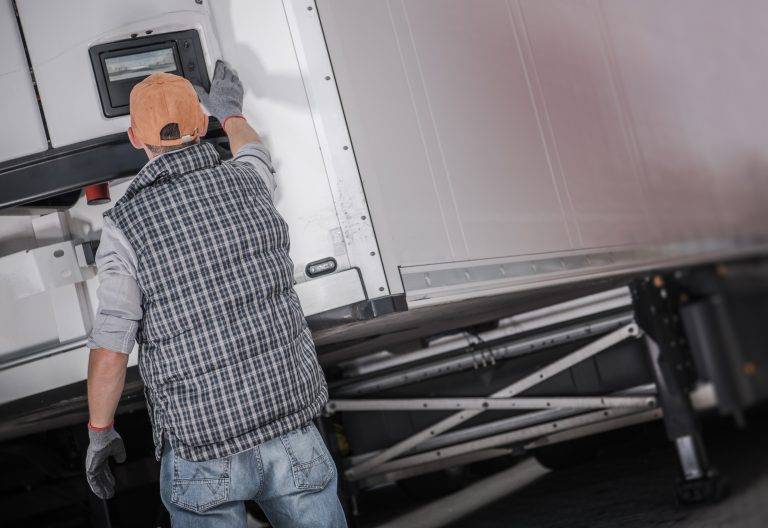 semi truck refrigerated semitrailer cargo temperature check performed by a driver